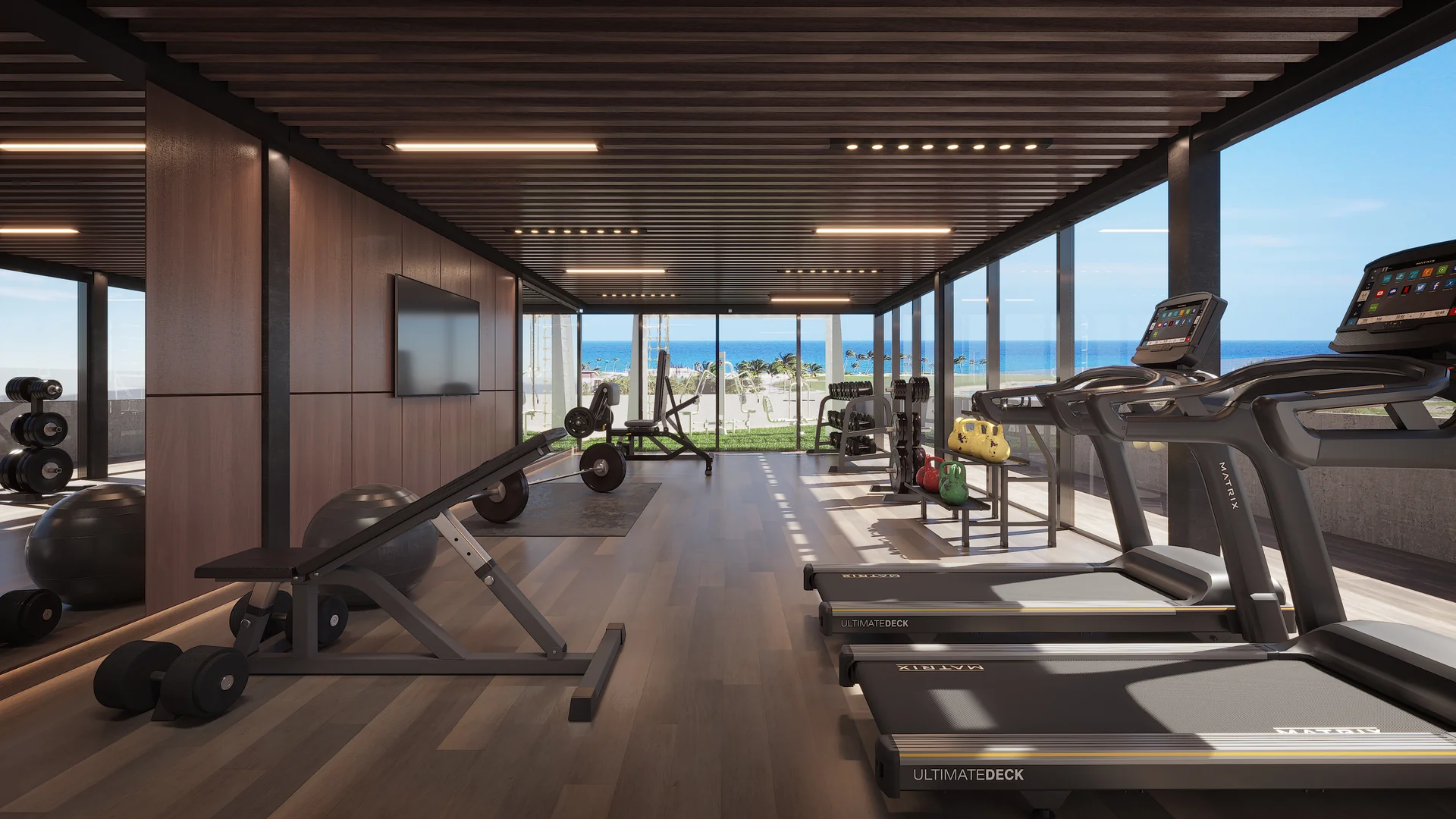 Klimatisiertes Hochleistungs-Fitnessstudio mit Fenstern zu Zen-Gärten.
